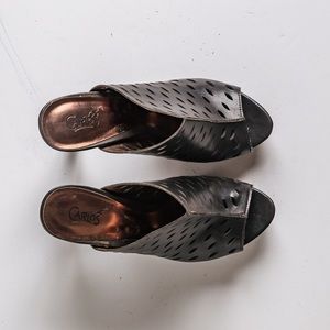 Perforated Slip-On Mules.